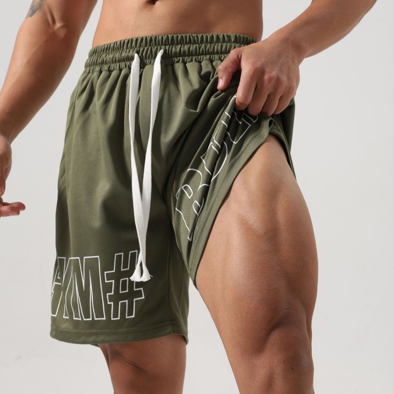 Men's fitness breathable ice silk shorts in black with mesh design