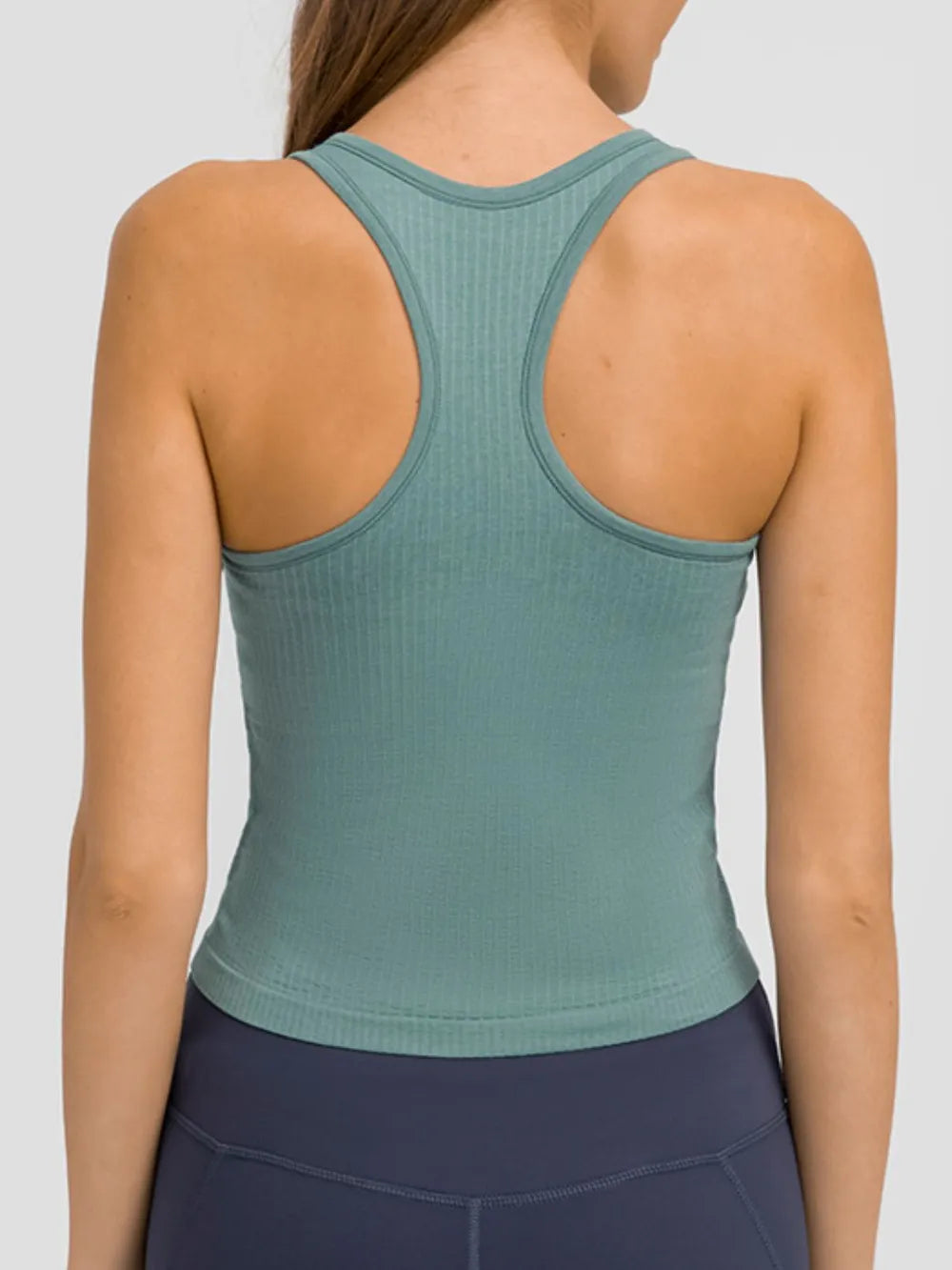 Back profile of aqua racerback tank with clear stitching details