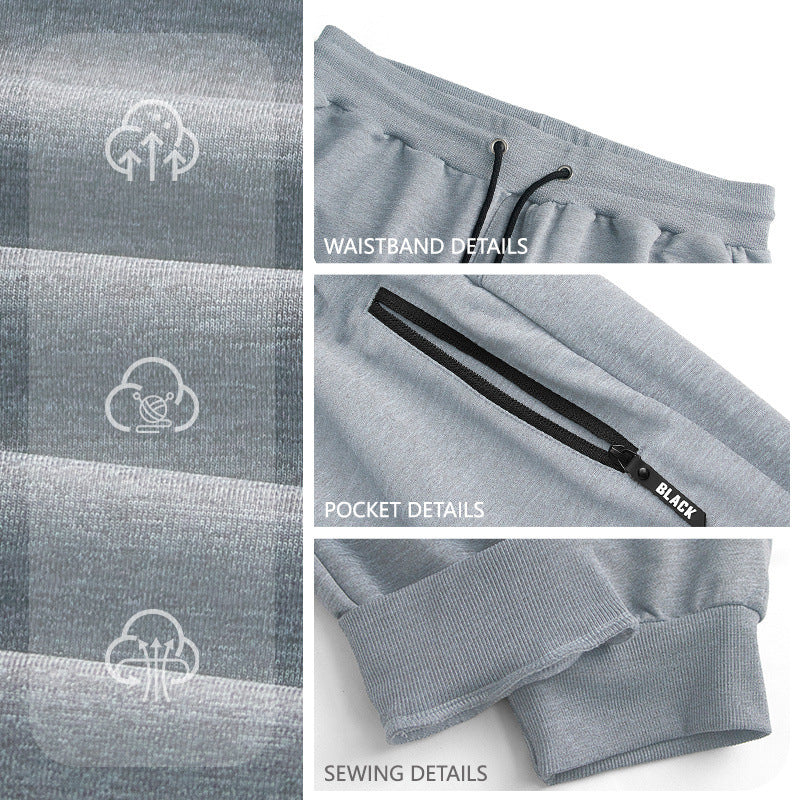Mens sporty long pants casual zip-cuff sweatpants in light heather gray polyester fabric with straight leg and mid-waist style