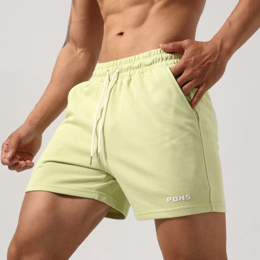Men's black workout shorts with padding and mid waist stretch cotton fabric