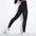 Black high waist hip lift yoga pants with mesh detailing.