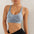 Womens cross strap sports tank top in brown and black, seamless nylon workout vest with tie-up shoulder straps and full cup design