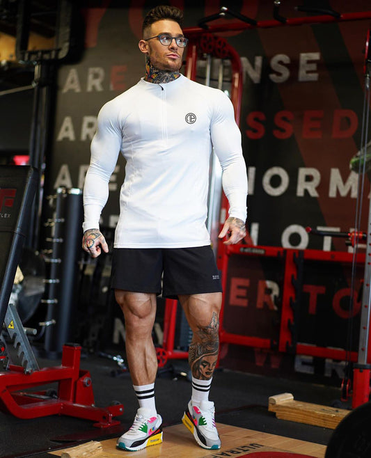 Men's black long sleeve zipper neck fitness shirt for gym and sports