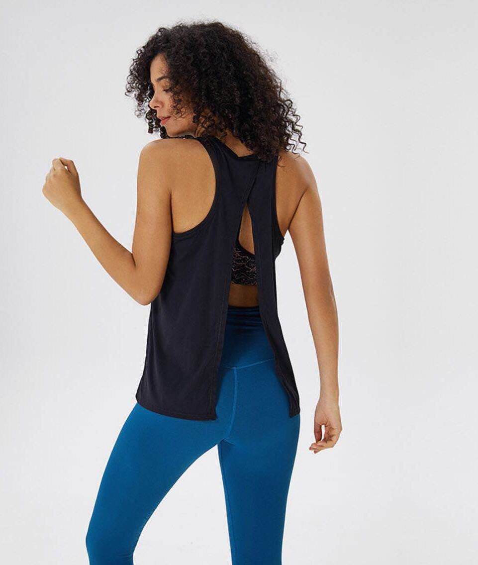 Women wearing loose yoga top sports shirts in various colors and sizes for workouts