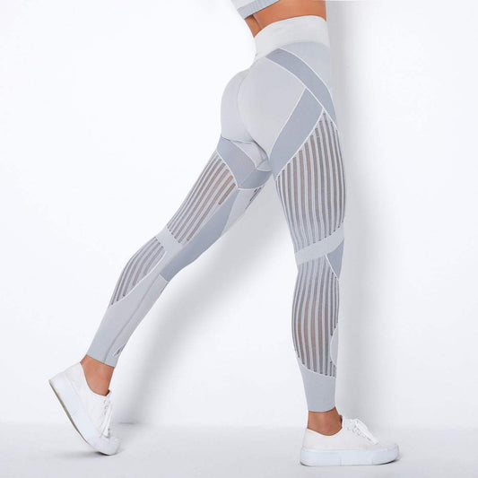 Light grey high waist yoga pants with unique pattern.