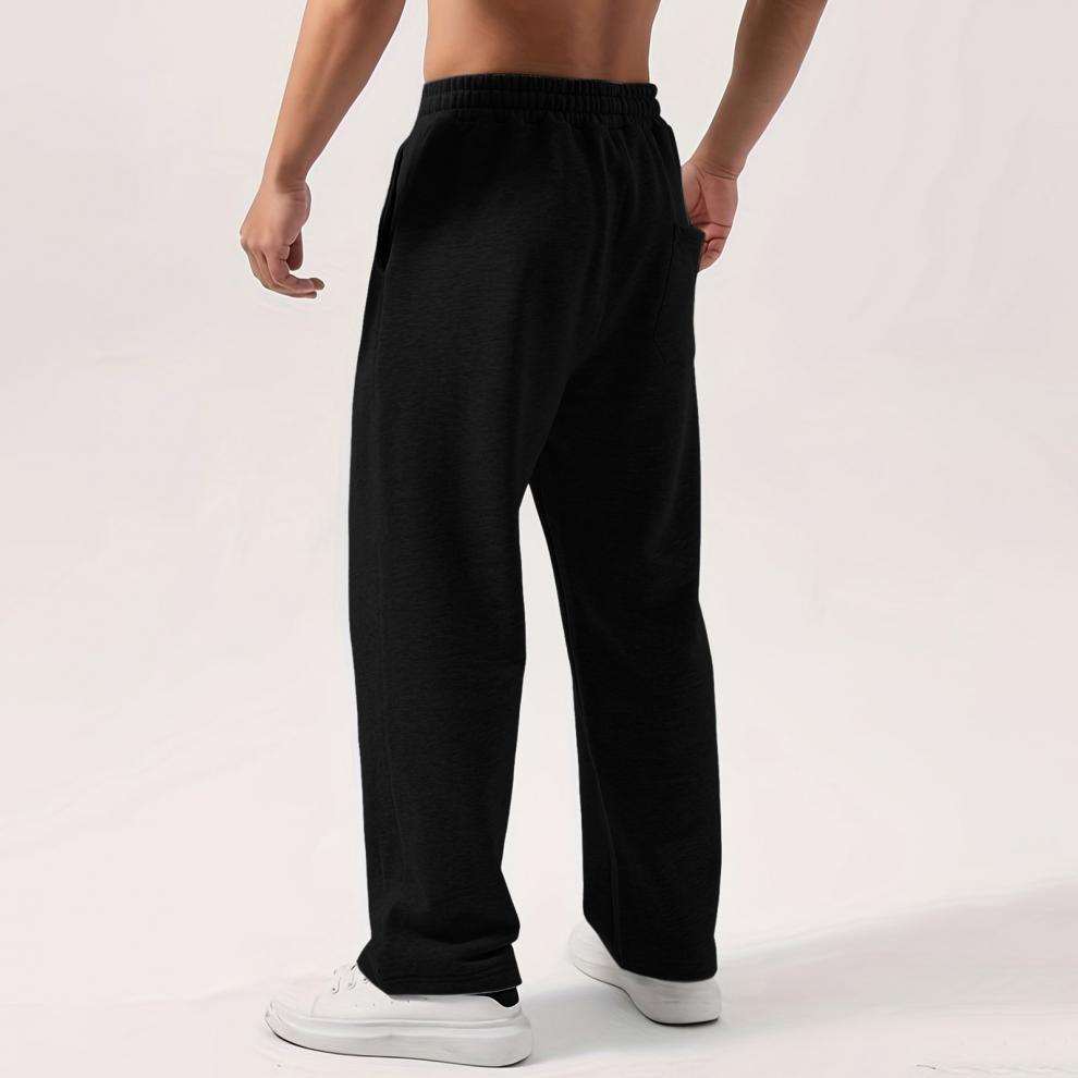 Male elastic-waist drawstring sweatpants in solid colors with wide-leg and loose fit design