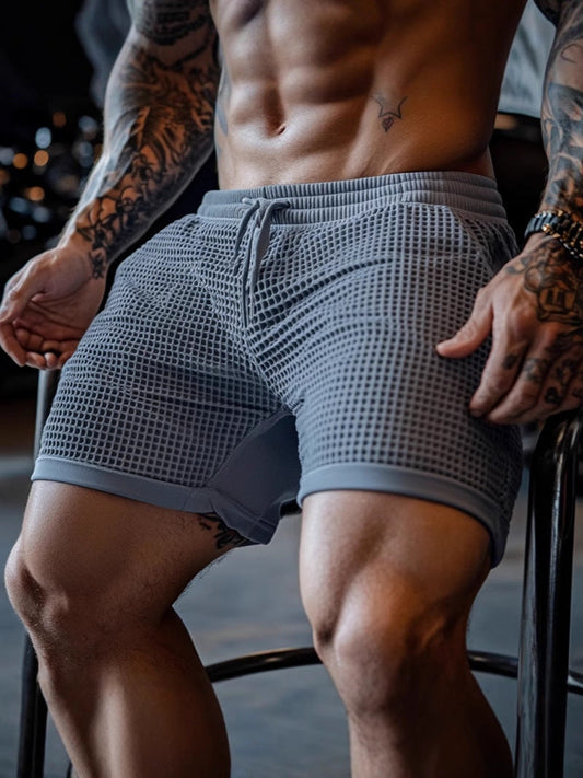 Gray men's sports workout shorts with polyester fabric and straight fit
