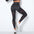 Dark grey yoga pants with striped design and high waist.
