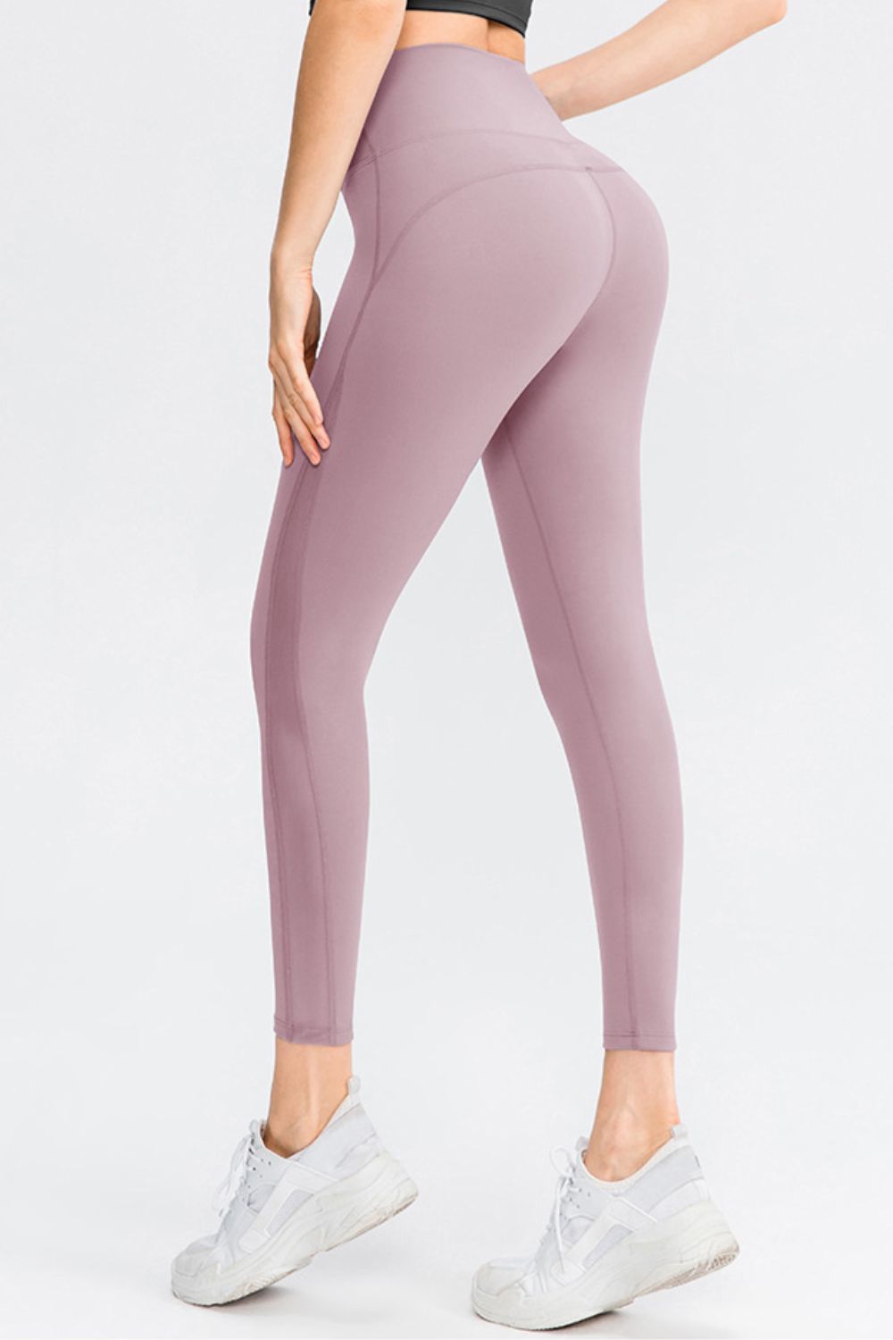 CoreLift Wide-Waist Performance Leggings in soft pink, designed for comfort and style, showcasing a flattering fit and seamless design.
