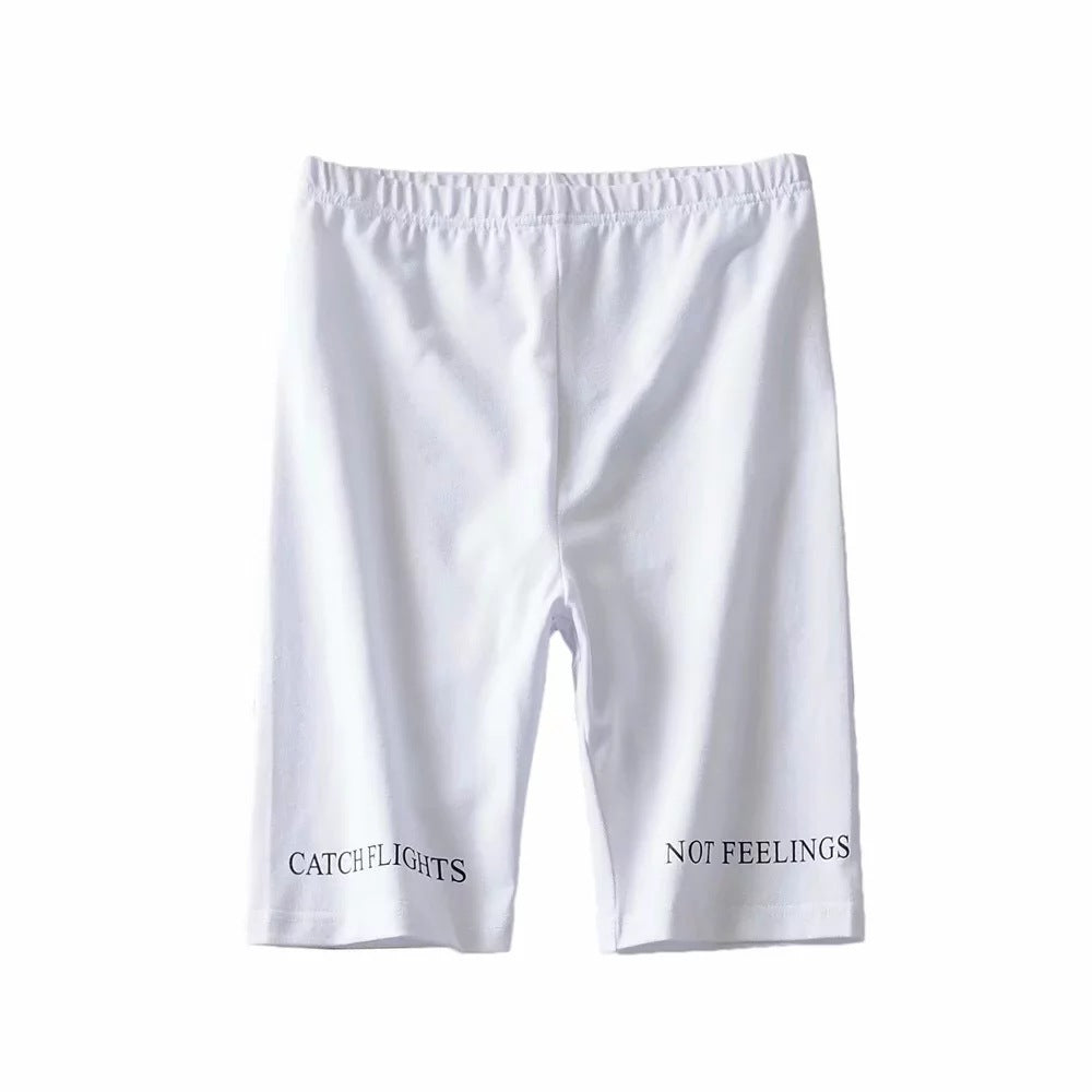 AlphaFlex Performance Training Shorts in white with "CATCH FLIGHTS" and "NOT FEELINGS" printed on the legs.