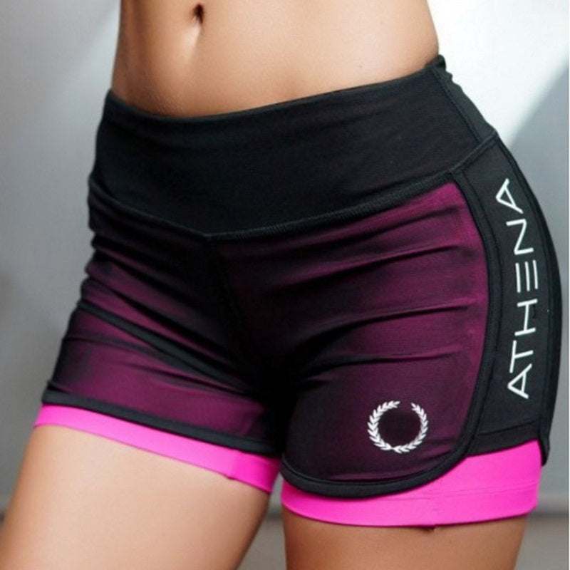 Women casual fake two-layer sports shorts for workout in green and pink colors