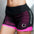Women casual fake two-layer sports shorts for workout in green and pink colors