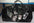 High quality thick PU leather gym bag with adjustable shoulder strap and multiple compartments for notebook and files