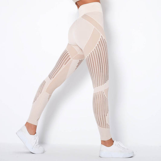 Beige high waist yoga pants featuring stylish stripes.