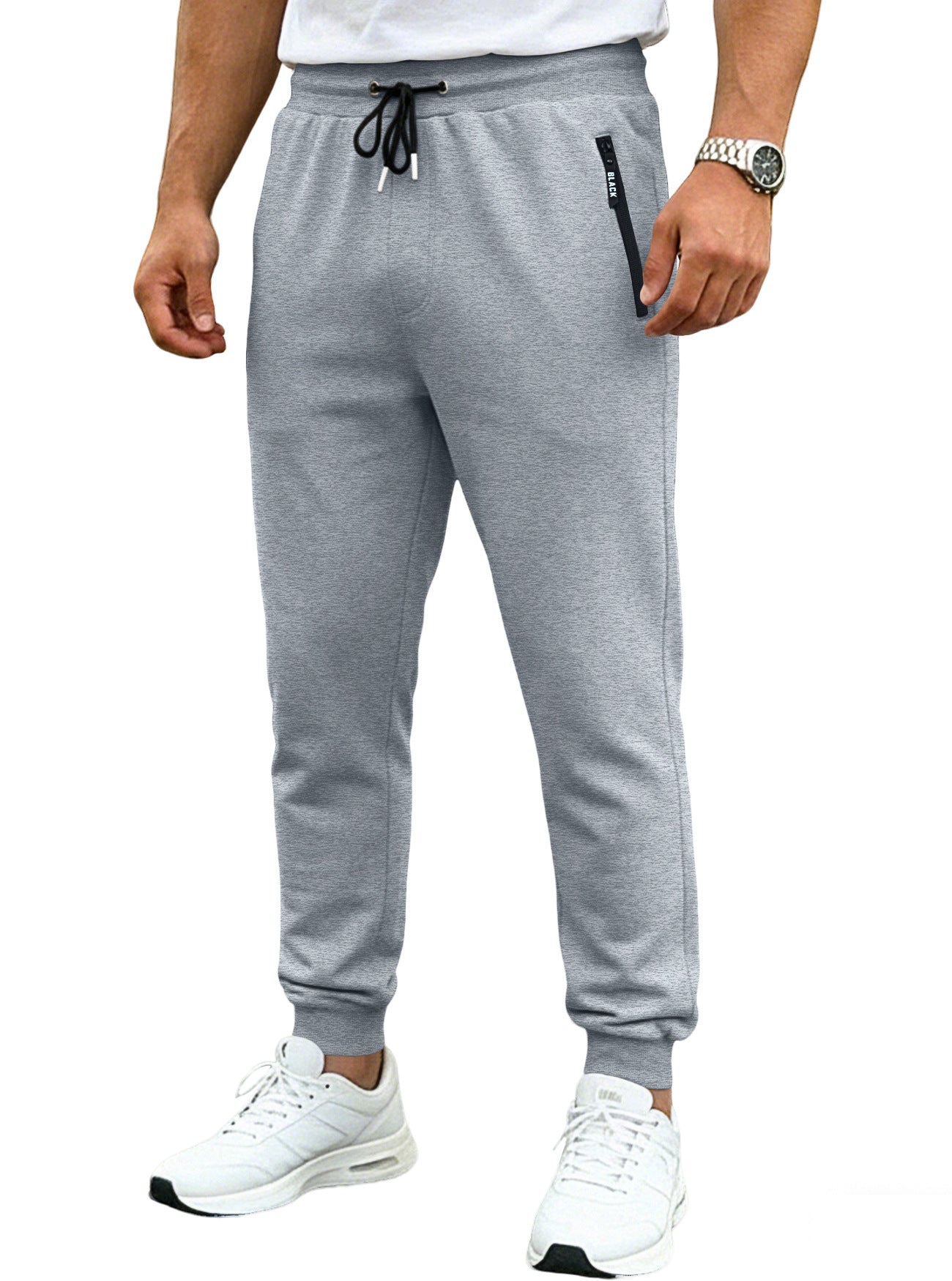 Men's sporty long pants in light heather gray with zip cuffs and mid-waist polyester fabric