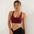Womens cross strap sports tank top in brown seamless nylon fabric for workout fitness vest