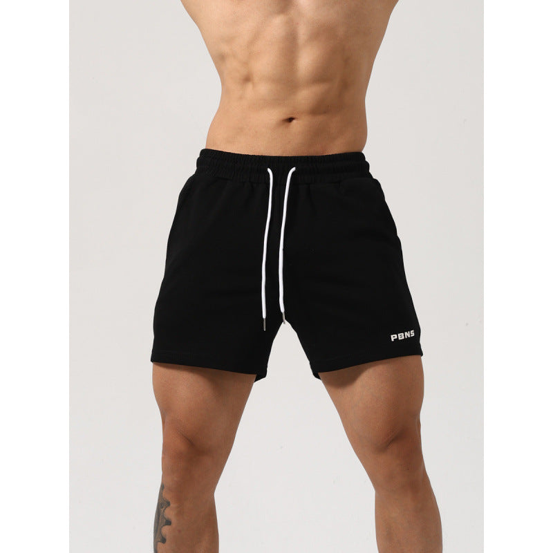 Men's stretch workout shorts with padding in black, white, gray, and green colors