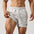 Men's black mid-waist padded workout shorts in cotton fabric
