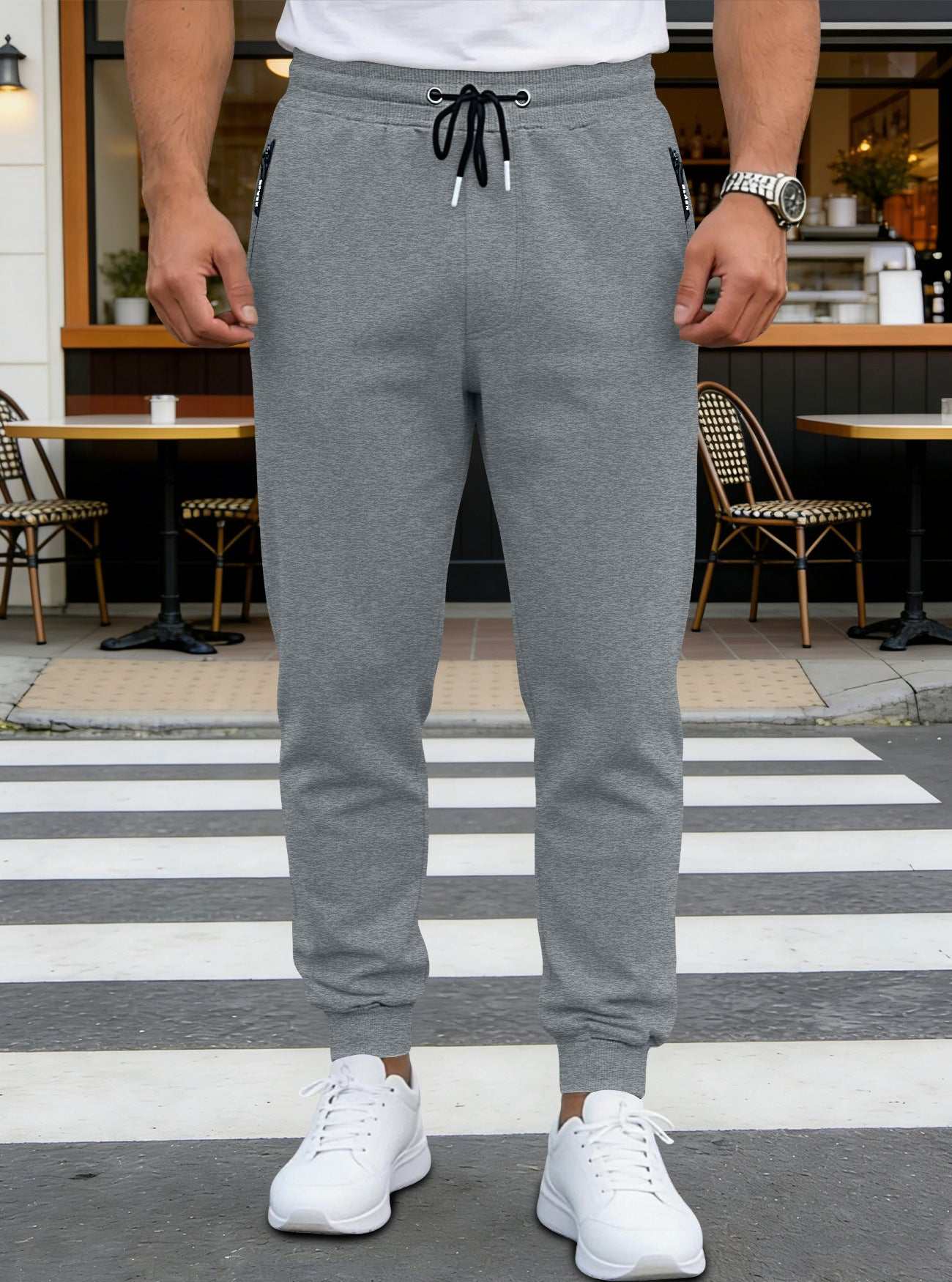 Mens sporty long pants casual zip-cuff sweatpants in light heather gray, black, and dark heather gray with mid-waist and straight leg style