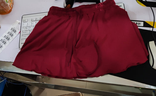 Women wearing scrunch-skirt cycling biker shorts for gym workout and running in various colors