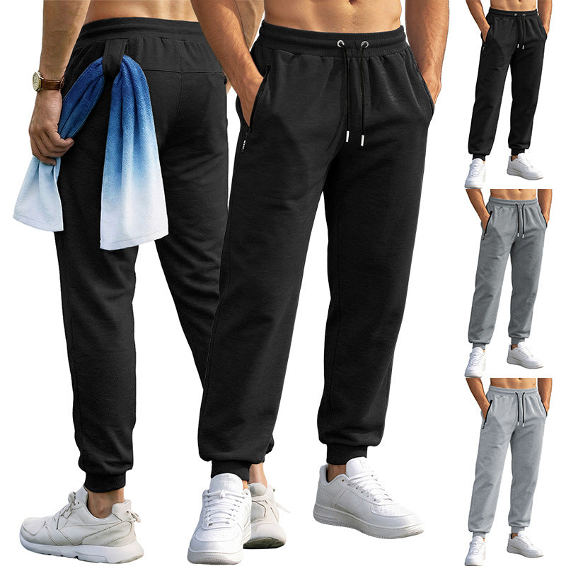 Men's sporty long pants casual zip-cuff sweatpants in light heather gray and black colors.