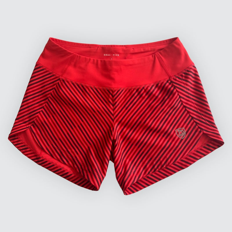 Excel Sculpt Performance Shorts in red with black stripes, designed for confident movement and comfort.