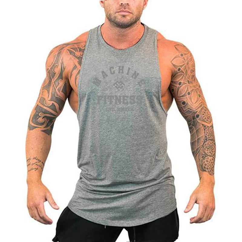 FlexFit Cotton Performance Tank worn by a muscular man, showcasing its sleeveless design and comfortable fit for workouts.