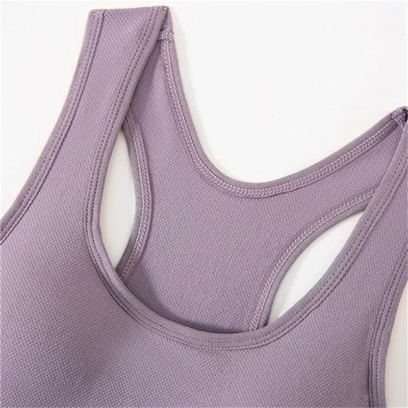 FlexForm Seamless Padded Fitness Bralette in soft lavender fabric with seamless design for ultimate comfort.