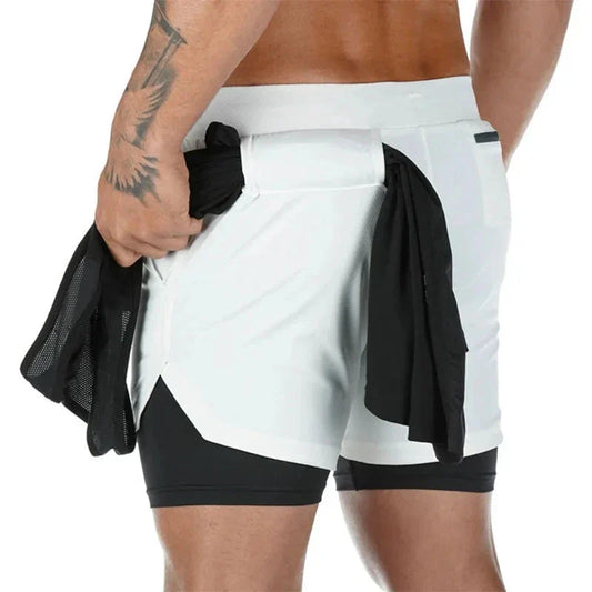 Man showcasing StealthFlex 2-in-1 Performance Training Shorts, highlighting flexibility and style during workouts.