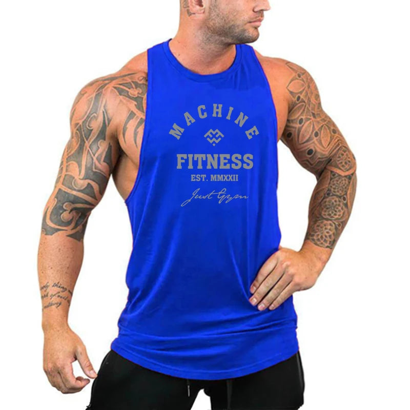 Man wearing a blue FlexFit tank top, showcasing comfort and mobility for workouts.