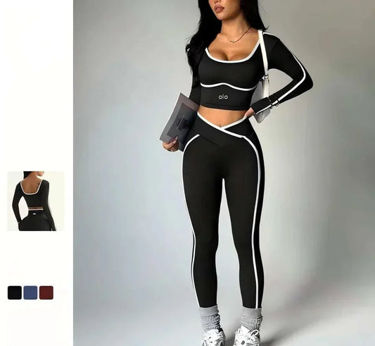 Woman wearing the 2026 Colorblock V-Waist Yoga Set in black and burgundy, showcasing four-way stretch fabric and high-rise V-waist leggings during yoga pose