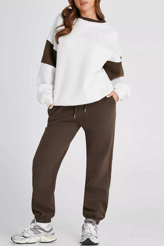 MotionFlex Sweatshirt model wearing matching joggers, showcasing a modern athletic look and comfort.