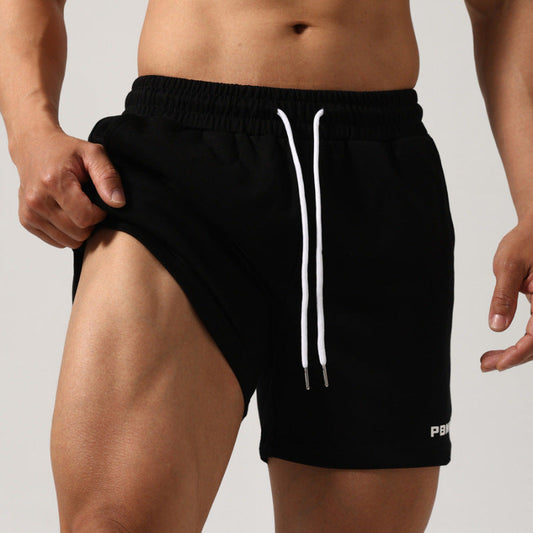 Men's workout shorts in black, white, gray, and green with padding and mid waist, made of cotton for casual and athletic wear