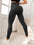 StrideFlex High-Waist Performance Joggers showcasing a seamless design and form-fitting silhouette in black.