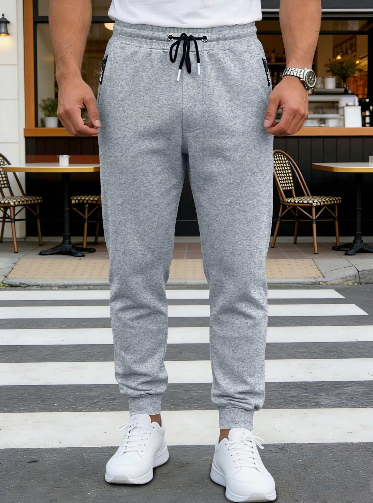 Mens sporty long pants casual zip-cuff sweatpants in light heather gray, black, and dark heather gray, mid-waist, full length, polyester stretch fabric