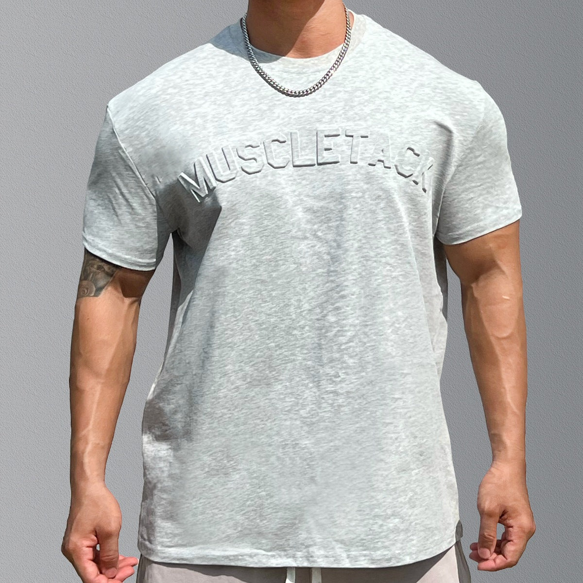 Men's loose cotton sports T-shirt with raglan sleeves in various solid colors for youth athletes