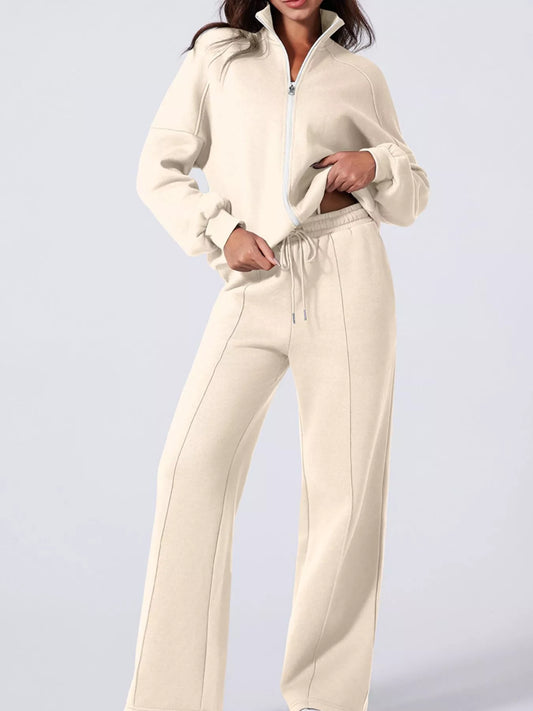MotionCore Zip-Up Active Set featuring a relaxed zip-up jacket and comfortable pants for versatile activewear.