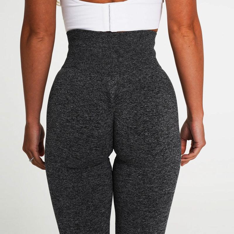 Model showcasing the SculptFlex Seamless High-Waist Performance Leggings from the back, highlighting their lift and shaping features.
