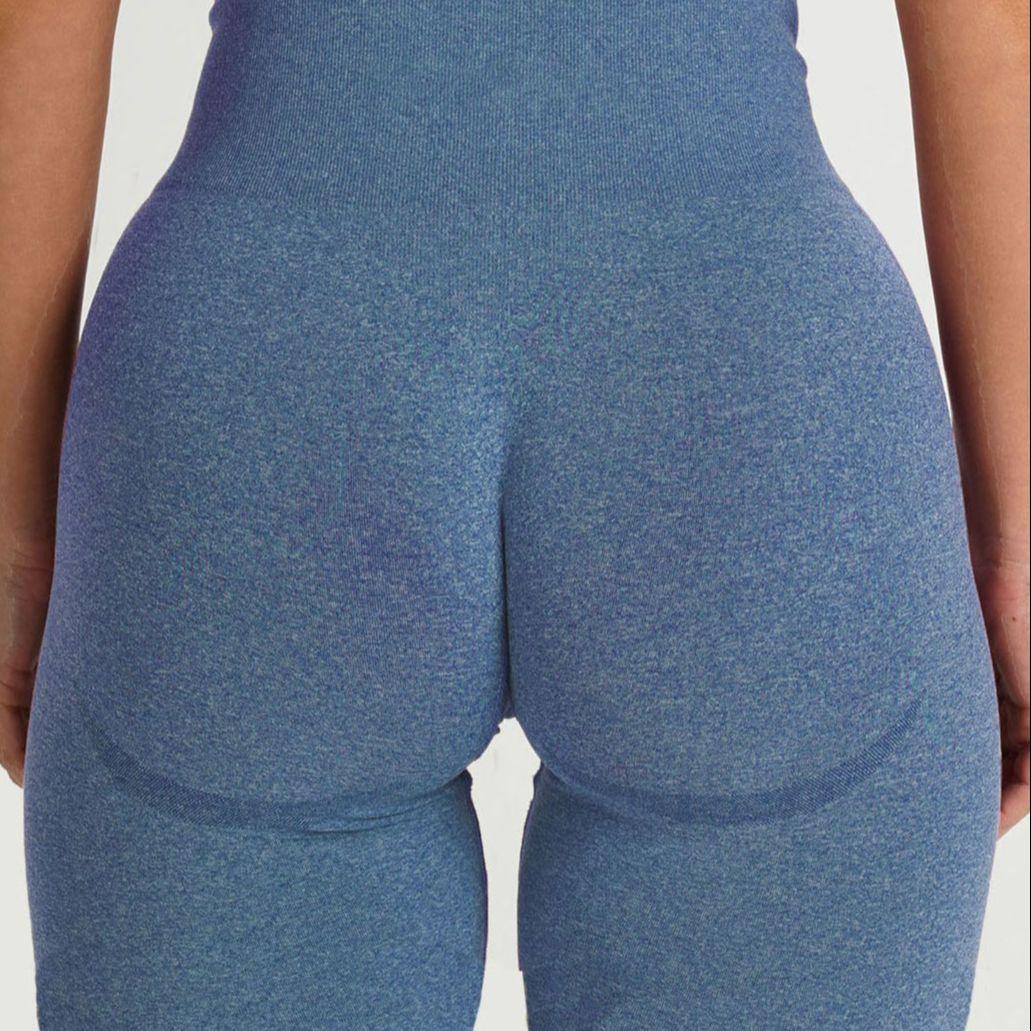 Back view of FlexCurve Seamless High-Waist Sculpt Shorts in soft blue fabric, highlighting sculpted fit.