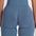 Back view of FlexCurve Seamless High-Waist Sculpt Shorts in soft blue fabric, highlighting sculpted fit.