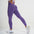 Model showcasing FlexCurve Seamless High-Waist Sculpt Shorts in purple, emphasizing comfort and style.