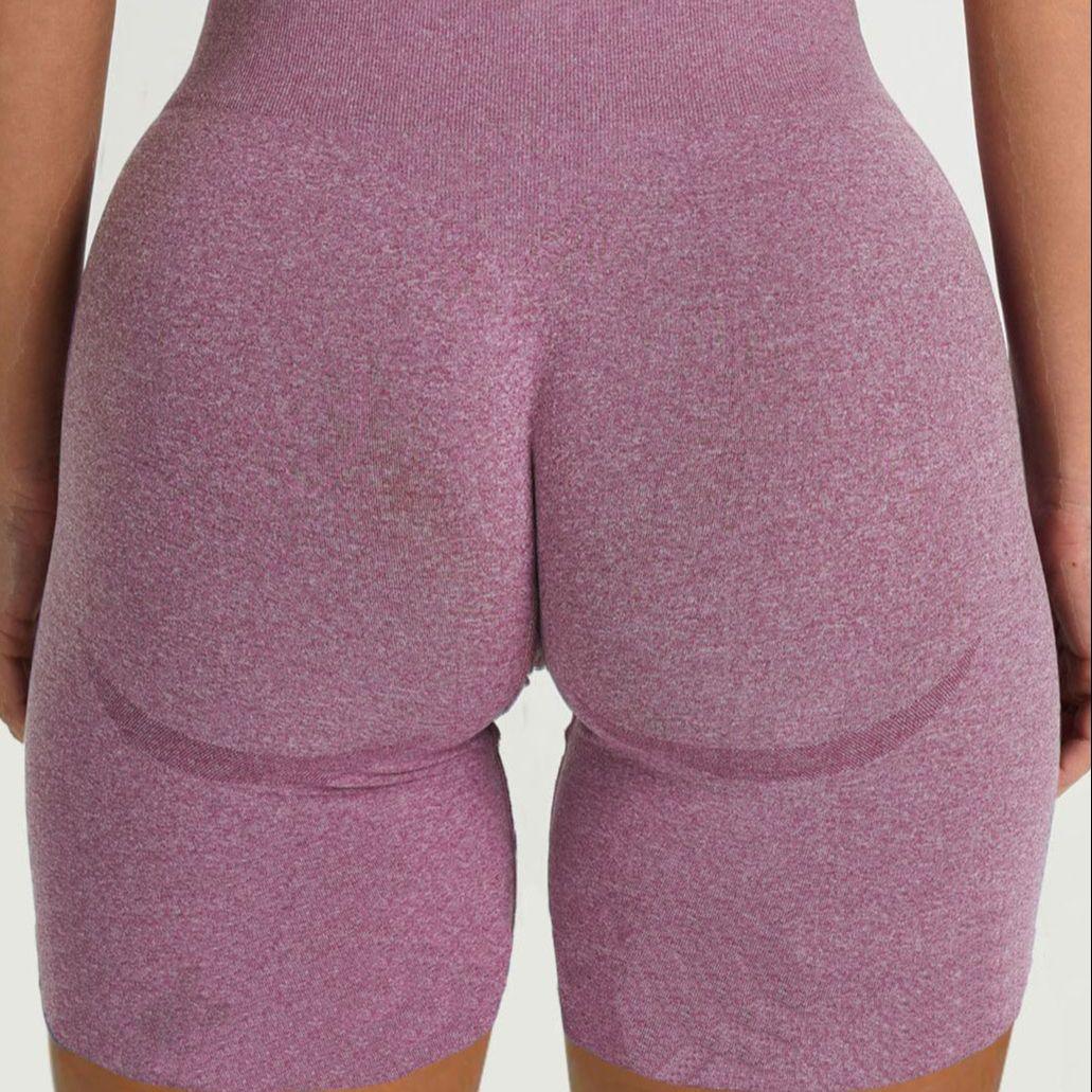 FlexCurve Seamless High-Waist Sculpt Shorts in pink showcasing a flattering, sculpting fit from the back.