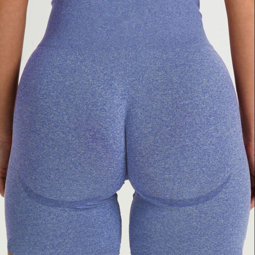 View of FlexCurve Seamless High-Waist Sculpt Shorts in blue, highlighting the sculpting fabric and high-waist design.